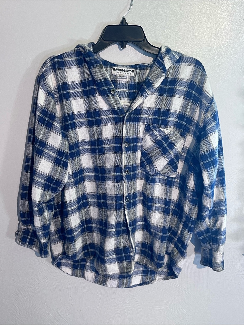 Vintage women’s Rhinoceros hooded flannel
Medium